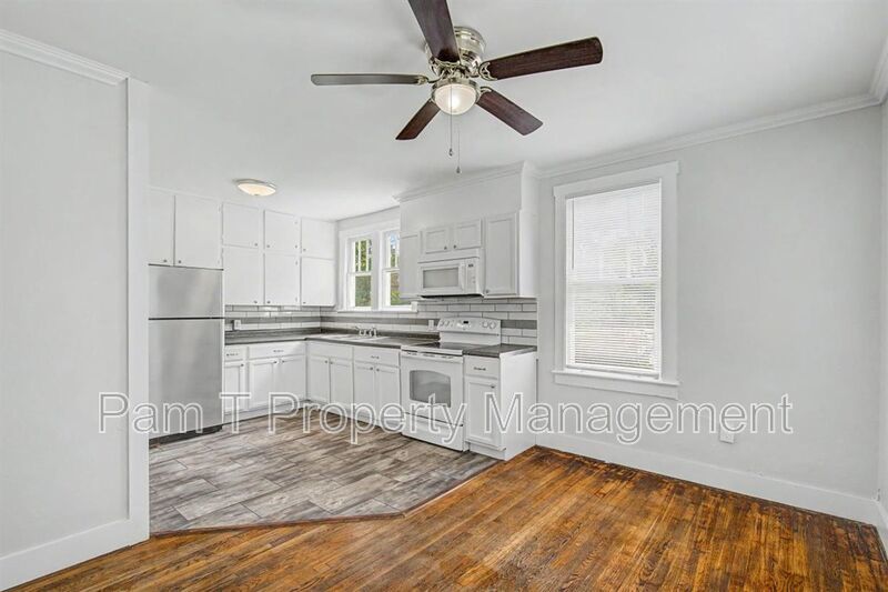 Upstairs 2-Bedroom | Private Balcony, Hardwood Floors & Included Water property image