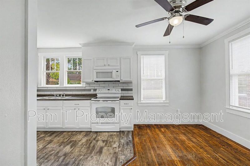 Upstairs 2-Bedroom | Private Balcony, Hardwood Floors & Included Water property image