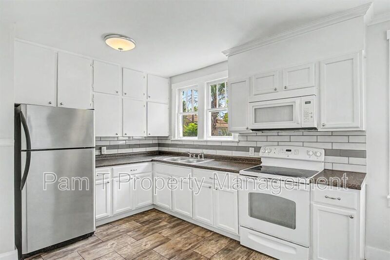 Upstairs 2-Bedroom | Private Balcony, Hardwood Floors & Included Water property image