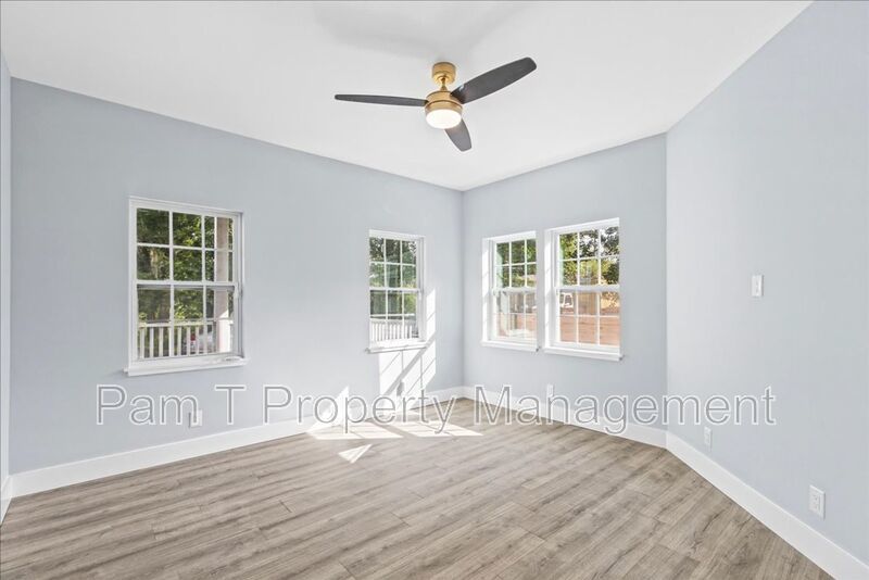 Renovated 4-Bedroom, 3-Bath Home | Fenced Yard & Off-Street Parking property image
