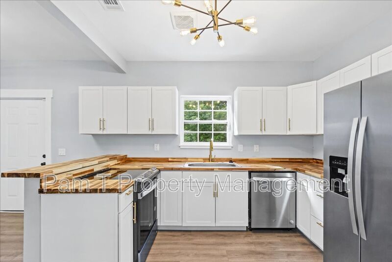Renovated 4-Bedroom, 3-Bath Home | Fenced Yard & Off-Street Parking property image