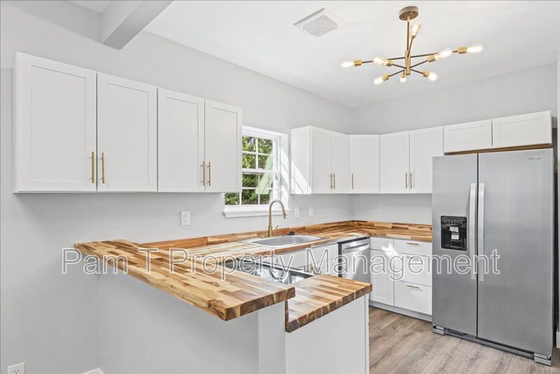 Renovated 4-Bedroom, 3-Bath Home | Fenced Yard & Off-Street Parking property image