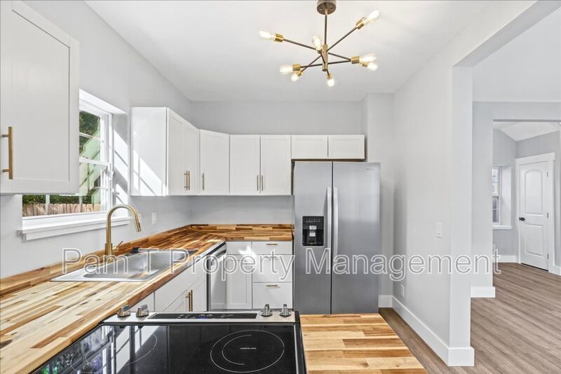 Renovated 4-Bedroom, 3-Bath Home | Fenced Yard & Off-Street Parking property image