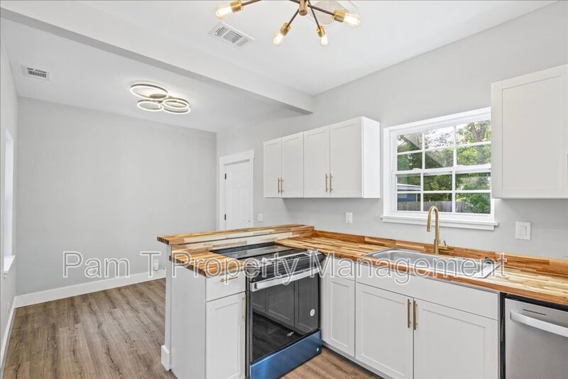 Renovated 4-Bedroom, 3-Bath Home | Fenced Yard & Off-Street Parking property image