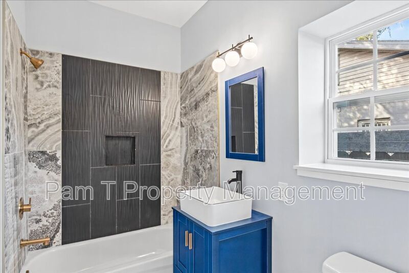 Renovated 4-Bedroom, 3-Bath Home | Fenced Yard & Off-Street Parking property image