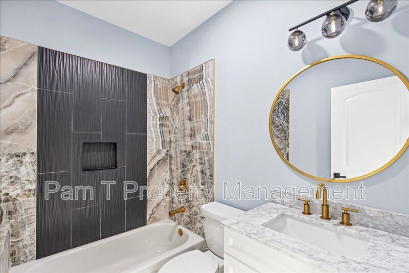 Renovated 4-Bedroom, 3-Bath Home | Fenced Yard & Off-Street Parking property image