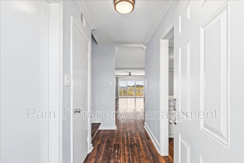 Stunning Waterfront Townhome in Gated Community – Deep-Water Views, Community Dock & Pool! property image
