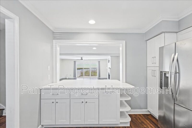 Stunning Waterfront Townhome in Gated Community – Deep-Water Views, Community Dock & Pool! property image